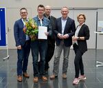 Nahm die Auszeichnung stellvertretend für den Masterstudierenden entgegen: Dr.- Ing. Möllerherm